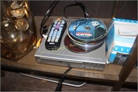 DVD PLAYER WITH REMOTE AND DVD'S