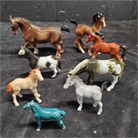 A Herd of Horse Figurines  - J