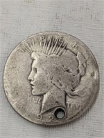 PUNCHED 1920’S SILVER PEACE DOLLAR
